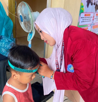 Dukung Pencegahan Stunting, Mahasiswa KKN STIT Muhammadiyah Lumajang Terlibat Aktif di Posyandu